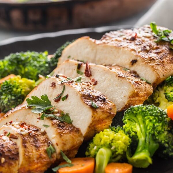 Roast chicken, roast potato, steamed vegetables and gravy - fresh