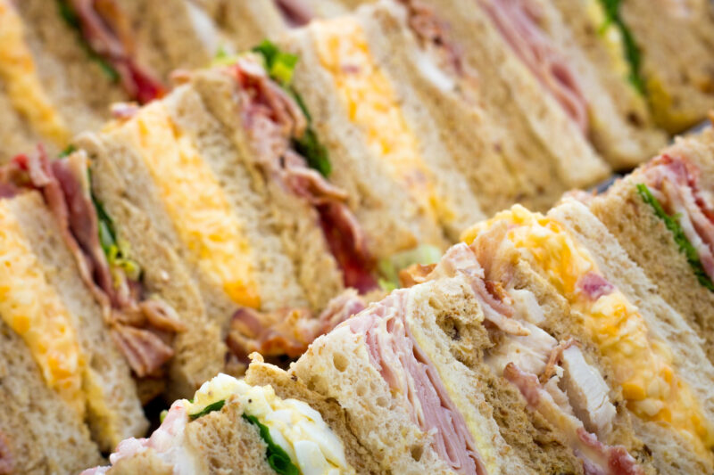 Platter - One bite petite pressed egg sandwiches - whole egg mayonnaise, relish cut into crustless bites (48 pieces) (Vegetarian)