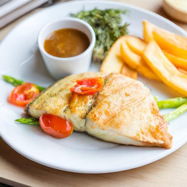 Pan seared Barramundi fillet with rosemary & garlic chat potatoes and steamed seasonal vegetables