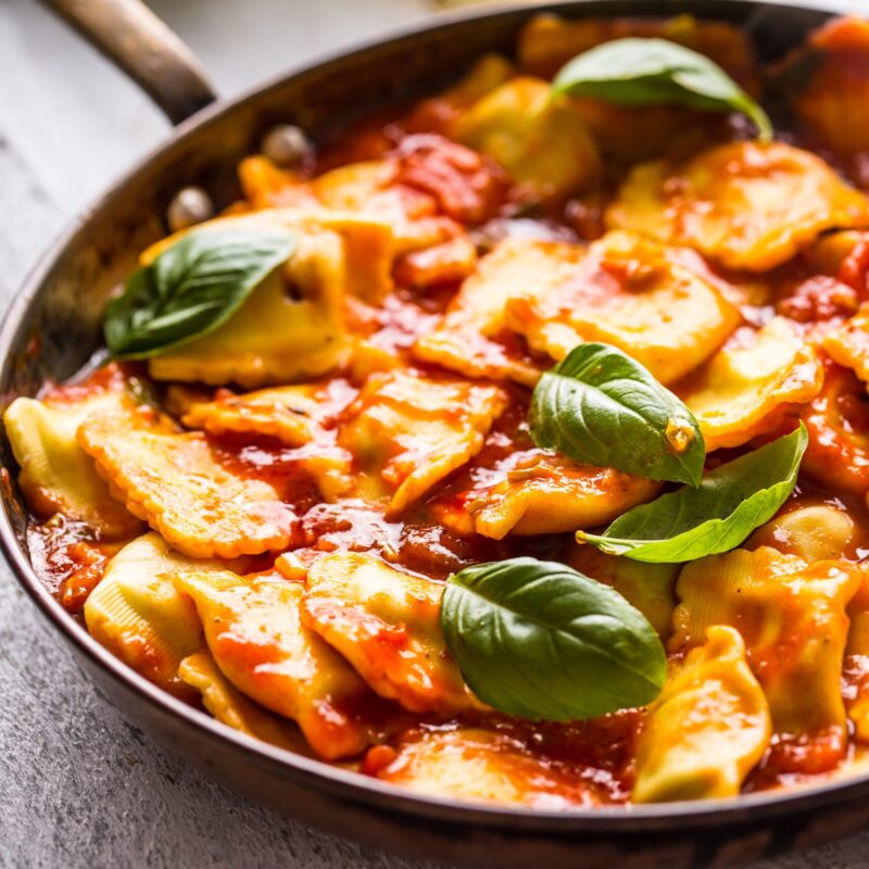 Pumpkin ravioli with tomato, basil sauce