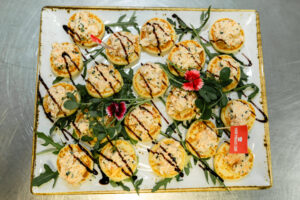Prawn in lime, chilli & herb kewpie Mayo on a jalapeno fritter