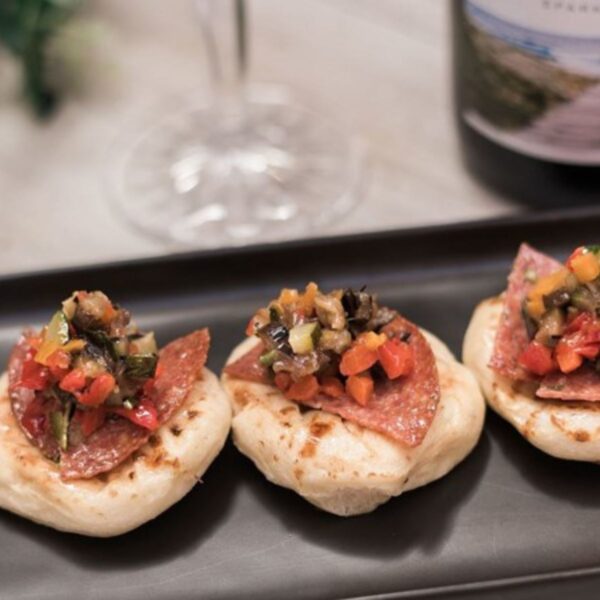Mini Pizzetta of salami & chopped antipasto veg & bocconcini