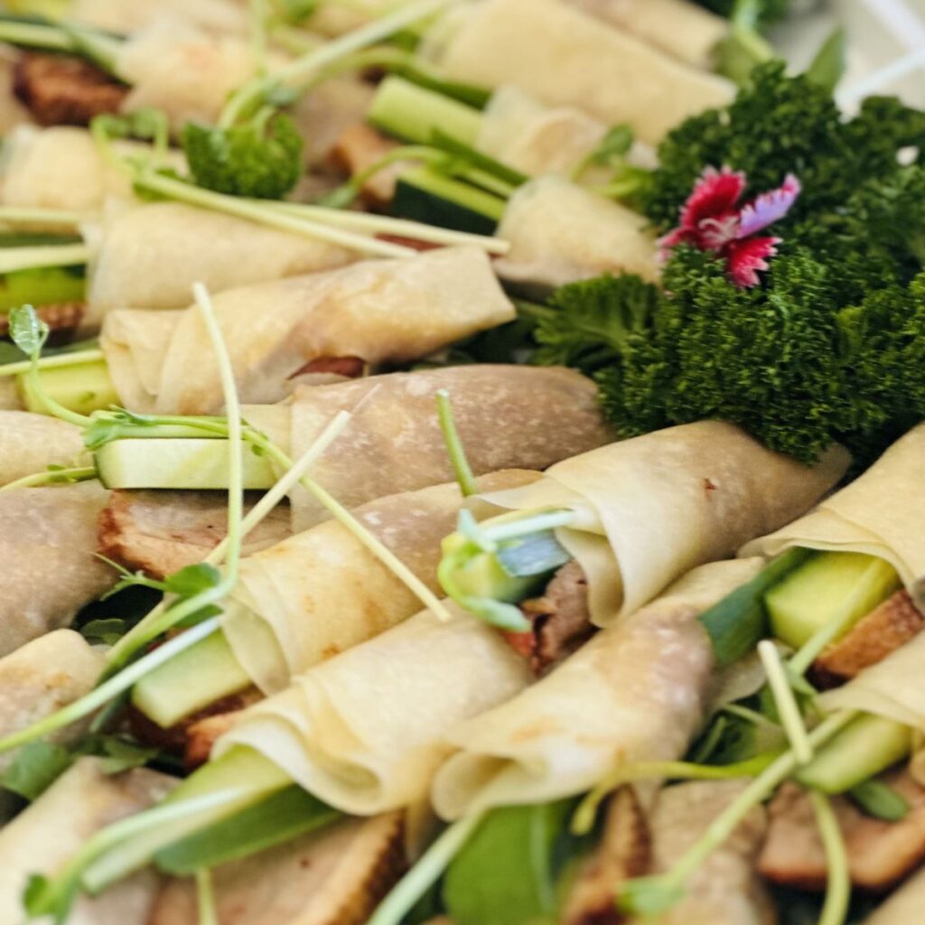 Peking duck, asian pancake, marinated in hoisin, with spicy dipping sauce