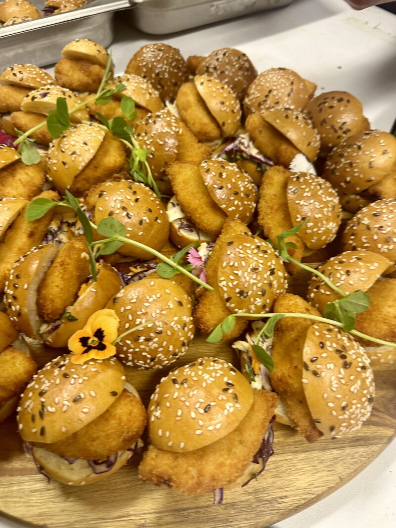Brioche mini burger bun with crisp chicken and chipotle mayo slaw