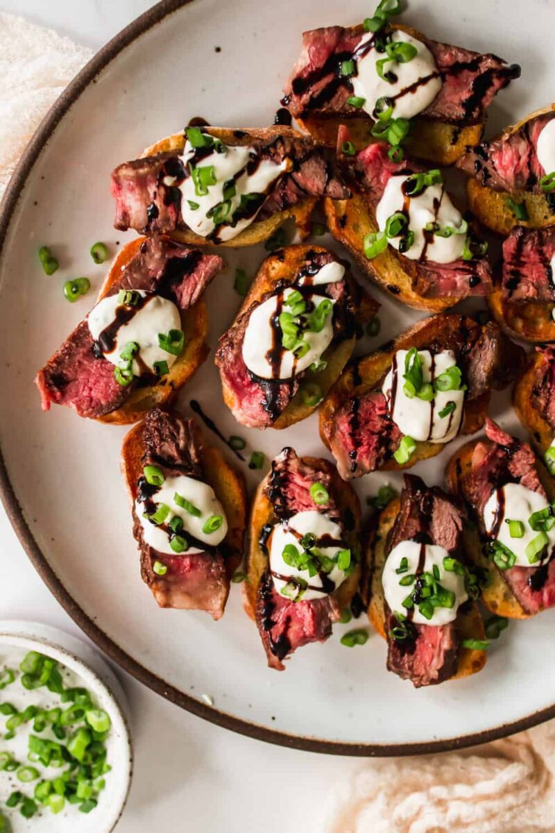 Rare beef tartare salsa Verde, truffled mayo and on crostini (df)